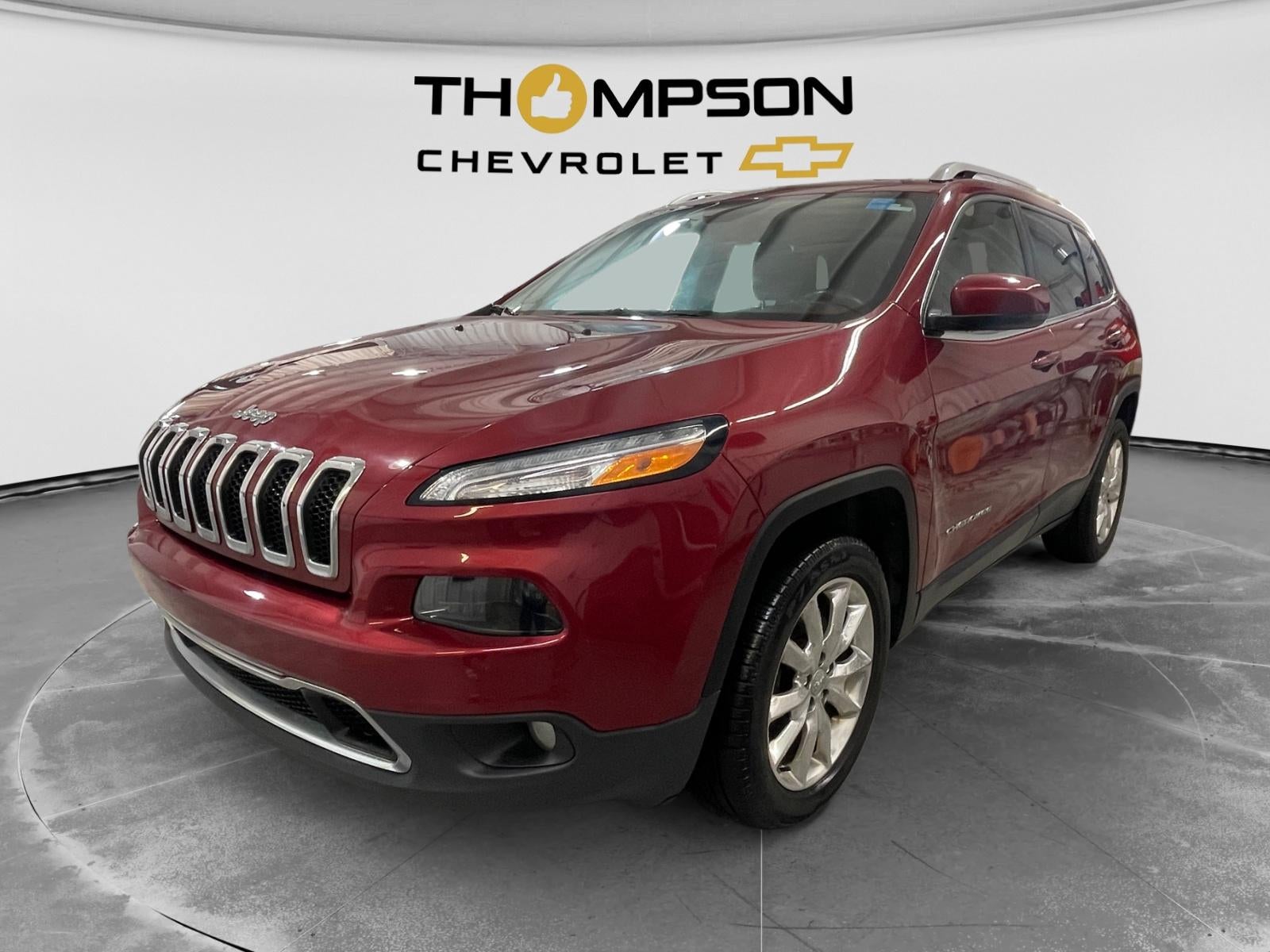 2017 Jeep Cherokee Limited in Red — front three-quarter view
