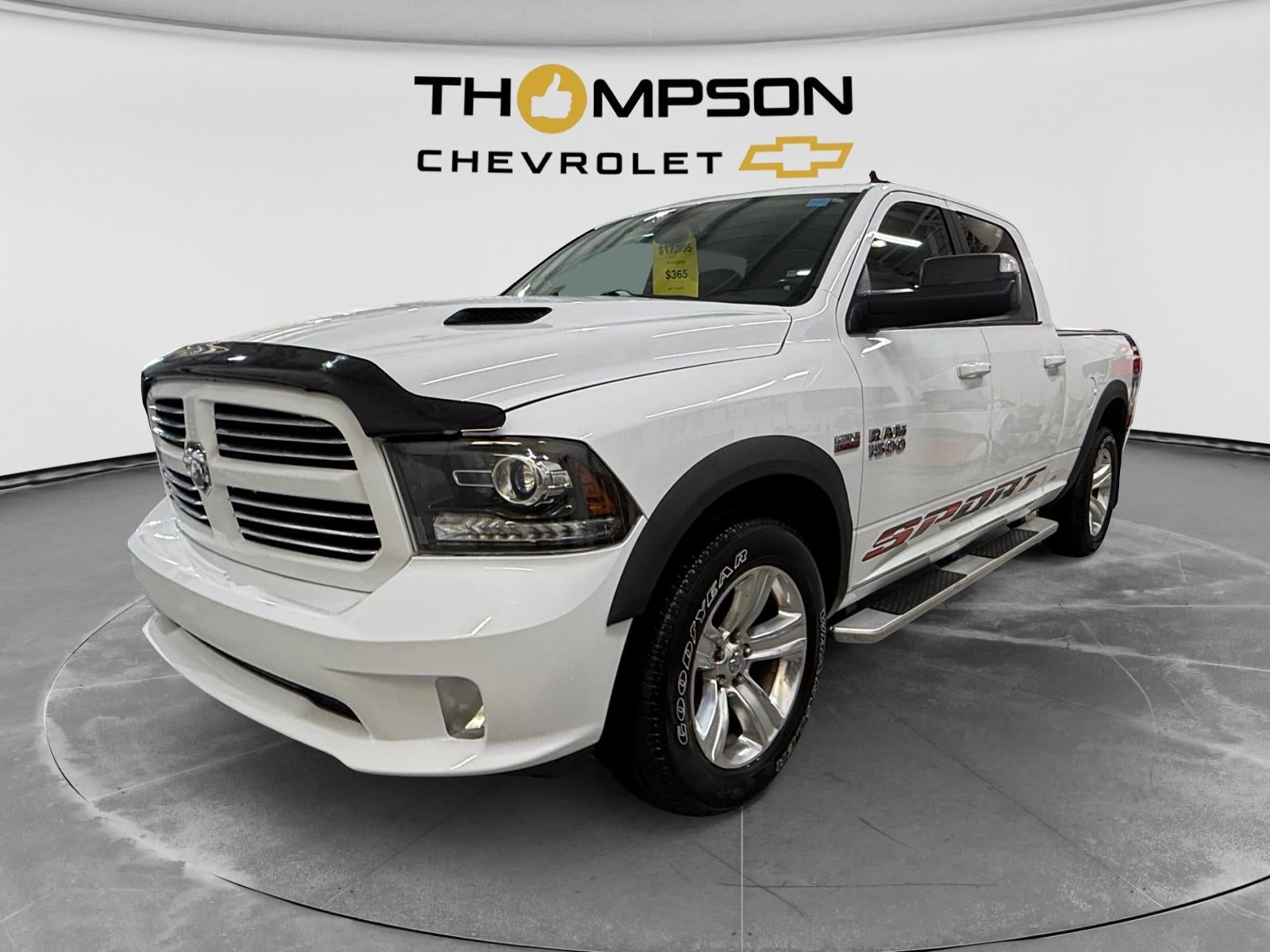 2014 RAM 1500 Sport in White — front three-quarter view