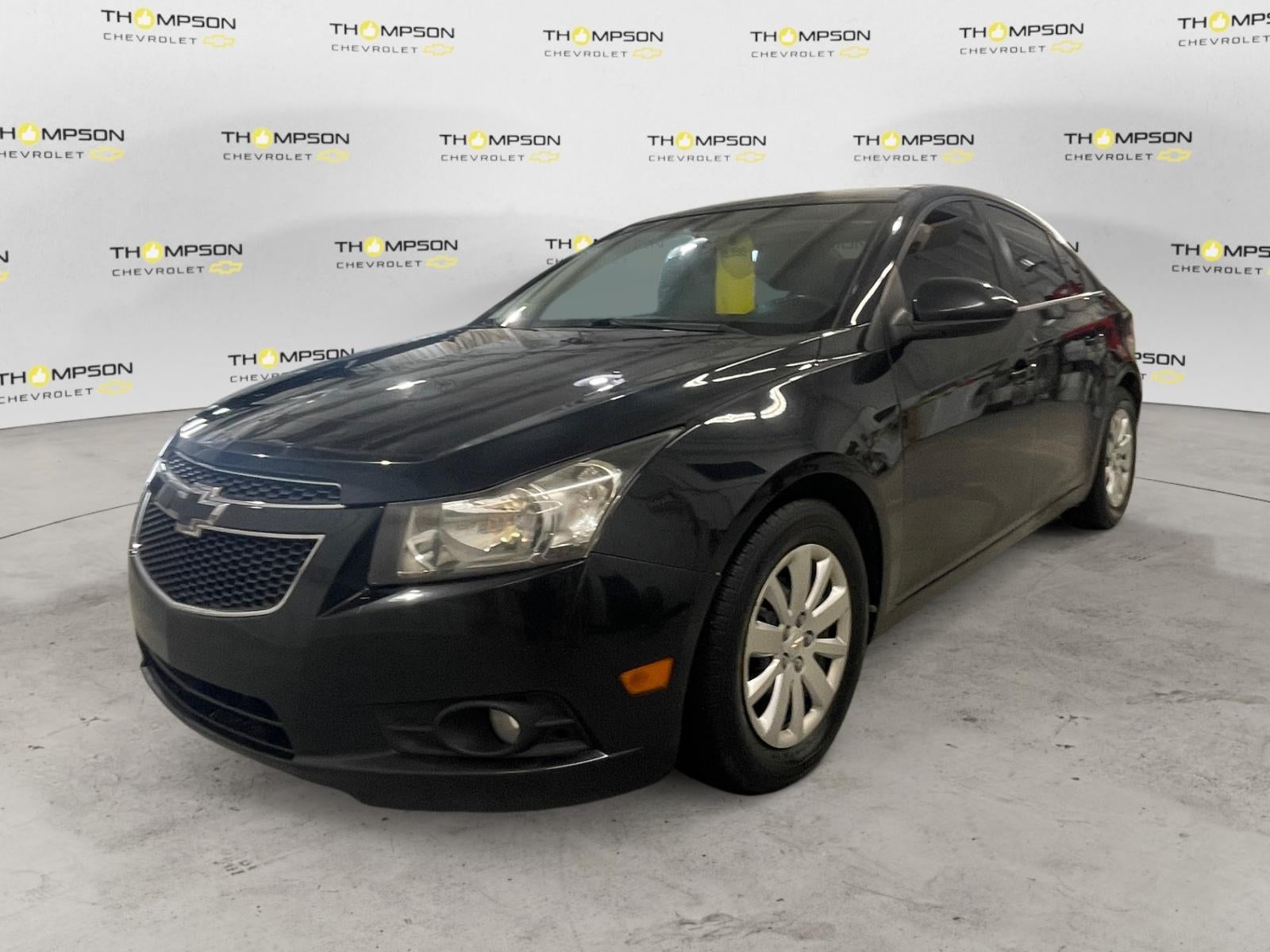 2011 Chevrolet Cruze LT w/1LT in Black Granite Metallic — front three-quarter view